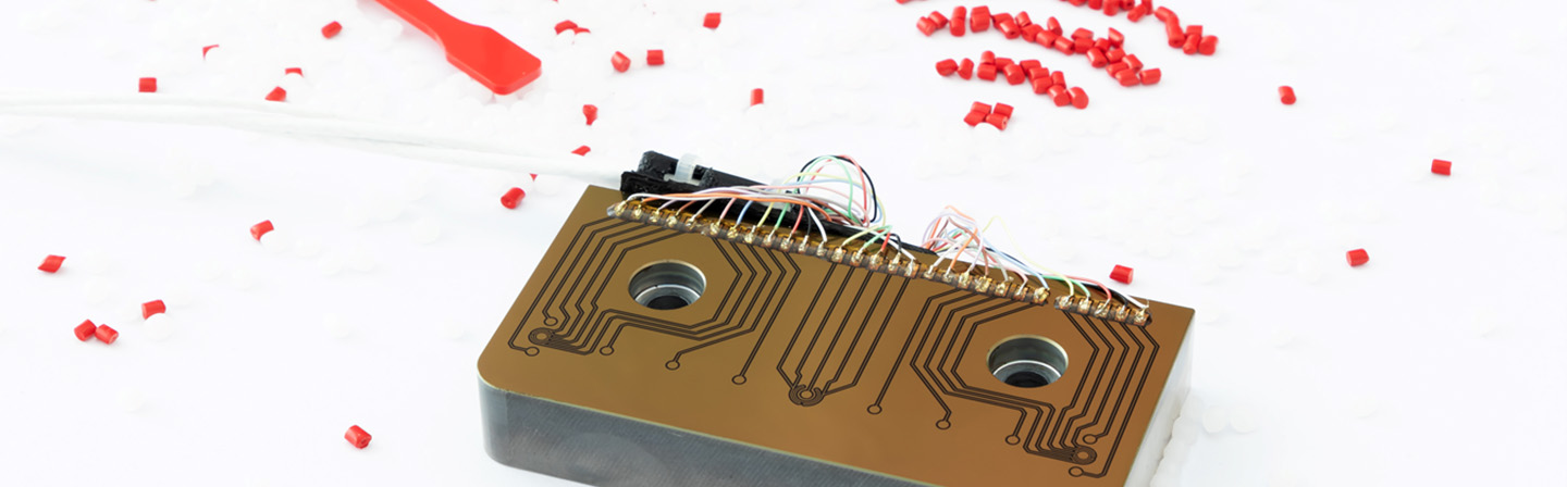 Sensory tool inserts with 13 measuring points Sensory tool inserts with 13 measuring points for injection molding, injection molding sample and plastic granulate.